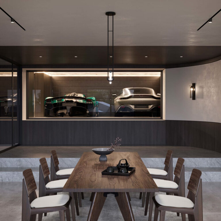 Opravdovou třešničkou na dortu v rámci architektonického návrhu je stylová automobilová galerie, do které je vidět přes prosklenou stěnu z obytné části.